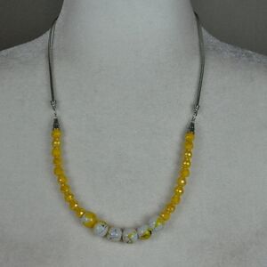 Vibrant Yellow and White Beaded Necklace with Metallic Accents